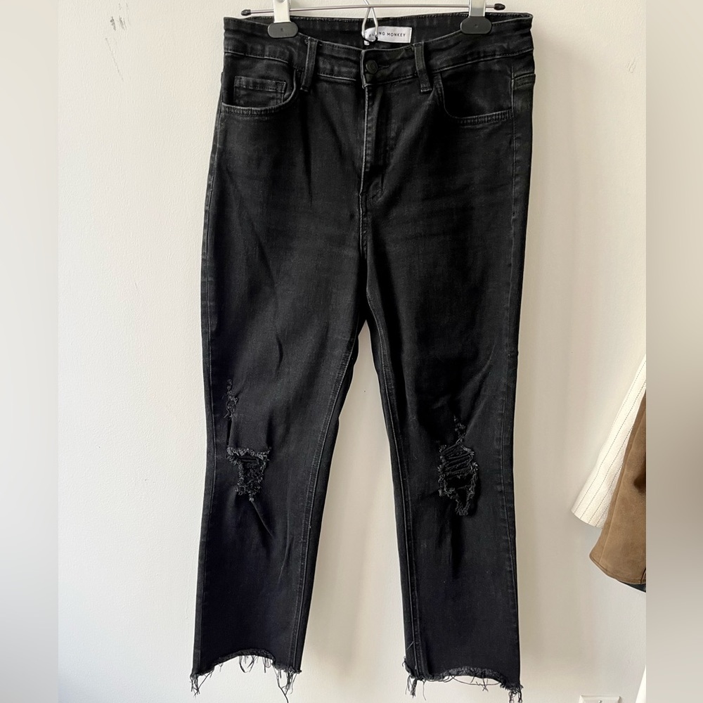 Flying Monkey Black distressed jeans in Black.